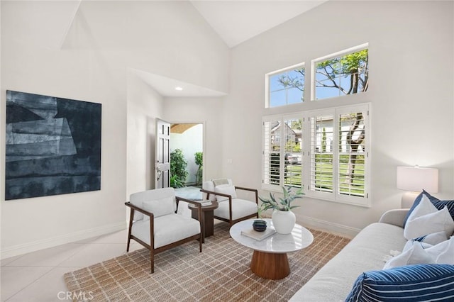 52 Anjou, Newport Coast, CA 92657 - tiled living room with high vaulted ceiling and baseboards