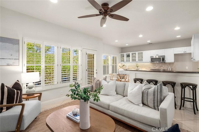 52 Anjou, Newport Coast, CA 92657 - living area with recessed lighting, ceiling fan, and light tile patterned floors