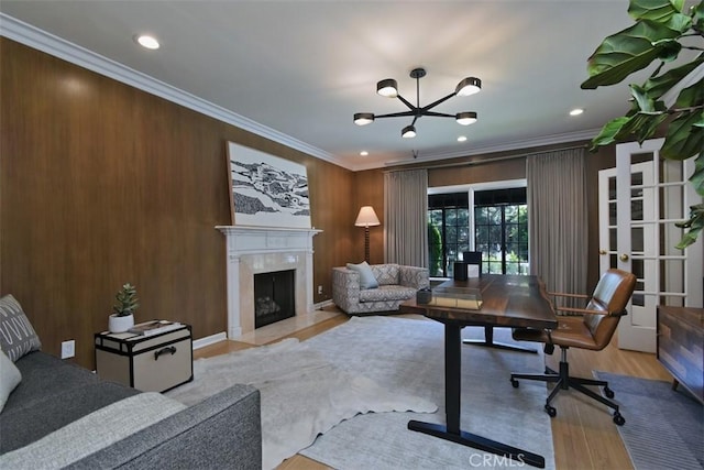 5005 Los Feliz Blvd, Los Angeles, CA 90027 - living room with ornamental molding, a fireplace with flush hearth, wood finished floors, a chandelier, and wooden walls