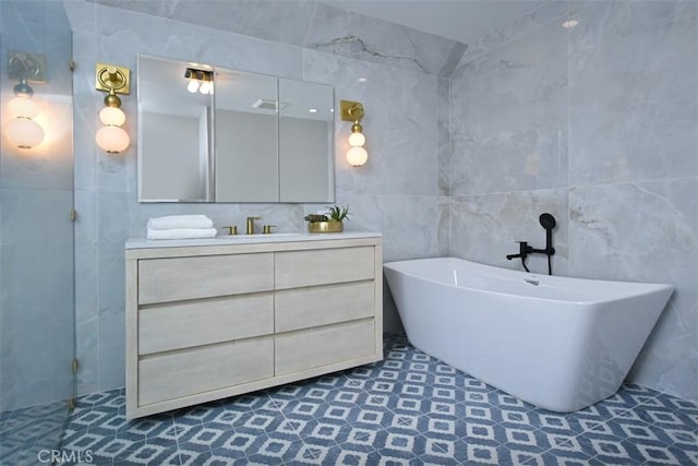5005 Los Feliz Blvd, Los Angeles, CA 90027 - bathroom featuring tile walls, vanity, and a soaking tub