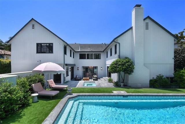 5005 Los Feliz Blvd, Los Angeles, CA 90027 - back of house featuring a chimney, an outdoor pool, a yard, a patio area, and an outdoor hangout area