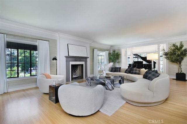5005 Los Feliz Blvd, Los Angeles, CA 90027 - living area featuring light wood-style flooring, a fireplace with flush hearth, and ornamental molding