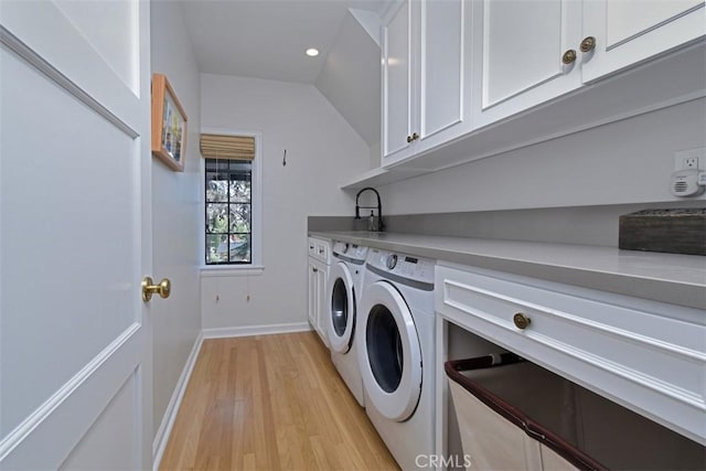 5005 Los Feliz Blvd, Los Angeles, CA 90027 - laundry room with washer and dryer, cabinet space, light wood-type flooring, and recessed lighting