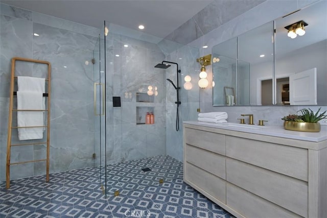 5005 Los Feliz Blvd, Los Angeles, CA 90027 - full bathroom featuring vanity, tiled shower, tile walls, and recessed lighting