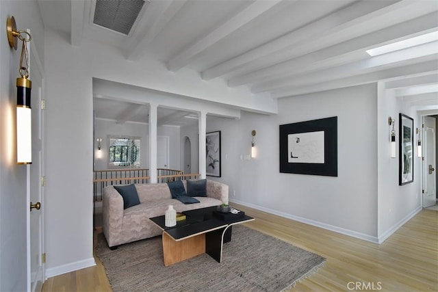 5005 Los Feliz Blvd, Los Angeles, CA 90027 - living room featuring beam ceiling and light wood-style flooring