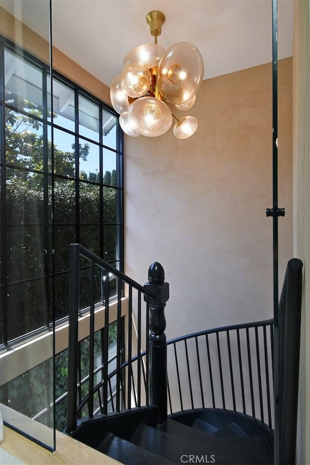 5005 Los Feliz Blvd, Los Angeles, CA 90027 - staircase featuring a chandelier
