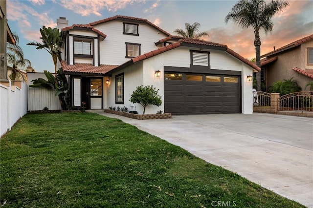 754 Manecita Cir, Perris, CA 92571 - mediterranean / spanish-style home featuring a tile roof, an attached garage, driveway, a chimney, and stucco siding