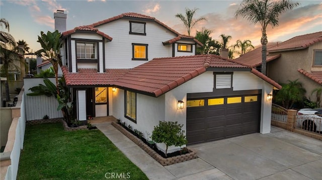 754 Manecita Cir, Perris, CA 92571 - mediterranean / spanish home featuring a tiled roof, a chimney, driveway, an attached garage, and stucco siding