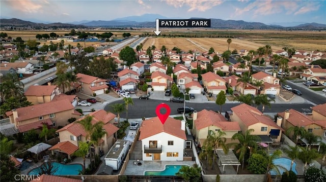 754 Manecita Cir, Perris, CA 92571 - aerial perspective of suburban area with a mountain backdrop