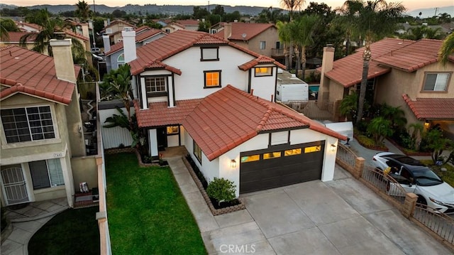 754 Manecita Cir, Perris, CA 92571 - view of front of house featuring a tile roof, stucco siding, a residential view, and driveway