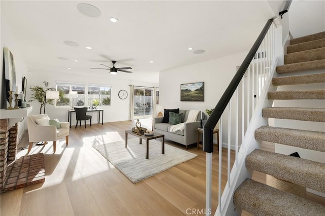 754 Manecita Cir, Perris, CA 92571 - living room featuring stairway, recessed lighting, light wood-type flooring, and ceiling fan