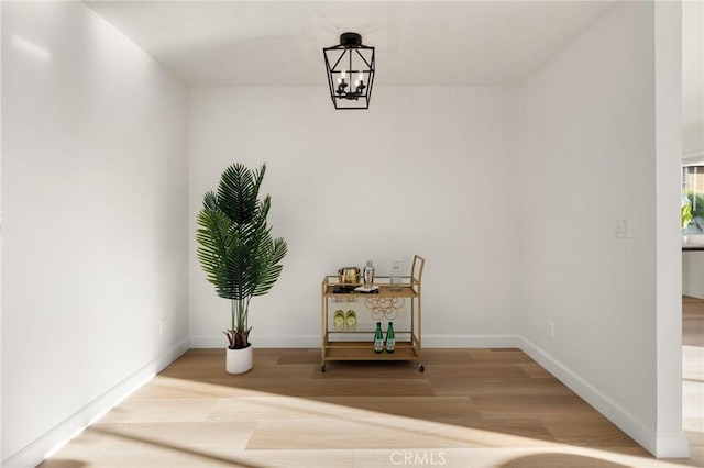 754 Manecita Cir, Perris, CA 92571 - detailed view of wood finished floors and a chandelier