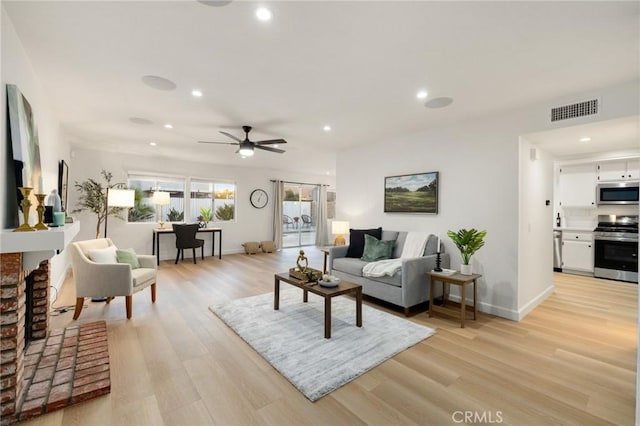 754 Manecita Cir, Perris, CA 92571 - living area with recessed lighting, light wood-type flooring, and ceiling fan