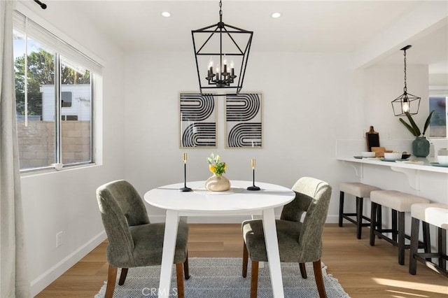 754 Manecita Cir, Perris, CA 92571 - dining area featuring wood finished floors, recessed lighting, and a chandelier