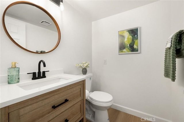 754 Manecita Cir, Perris, CA 92571 - half bathroom with vanity and wood finished floors