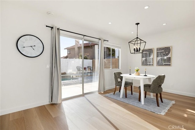 754 Manecita Cir, Perris, CA 92571 - dining room featuring a chandelier, light wood-style flooring, and recessed lighting