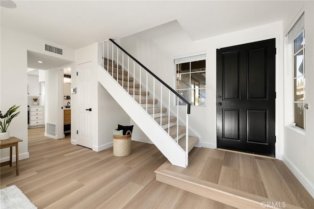 754 Manecita Cir, Perris, CA 92571 - foyer featuring stairway and light wood finished floors