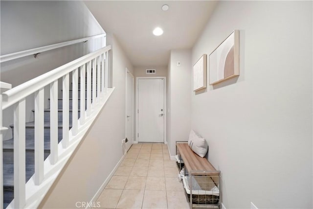 2651 W Lincoln Ave Unit 41, Anaheim, CA 92801 - entryway featuring light tile patterned floors, stairs, and recessed lighting