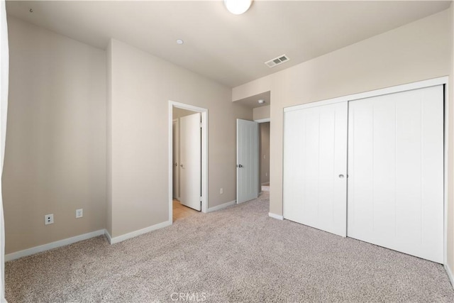 2651 W Lincoln Ave Unit 41, Anaheim, CA 92801 - unfurnished bedroom featuring light colored carpet and a closet