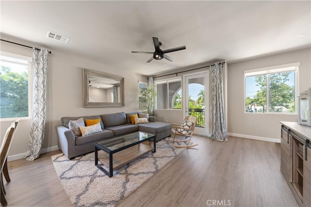 2651 W Lincoln Ave Unit 41, Anaheim, CA 92801 - living area with light wood-style floors and a ceiling fan