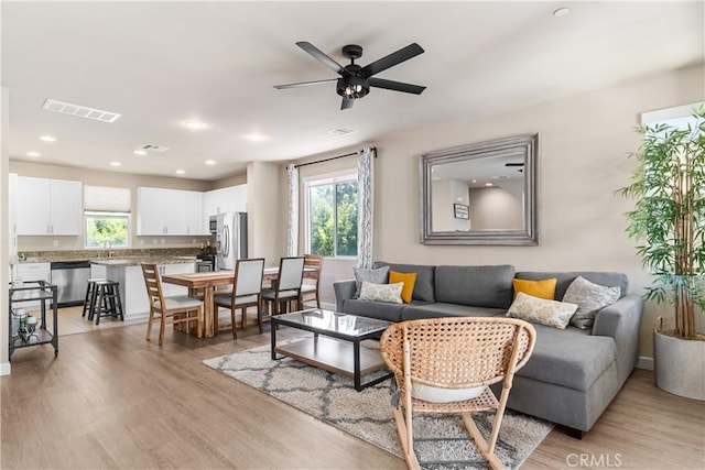 2651 W Lincoln Ave Unit 41, Anaheim, CA 92801 - living area with a ceiling fan, light wood-style flooring, and recessed lighting