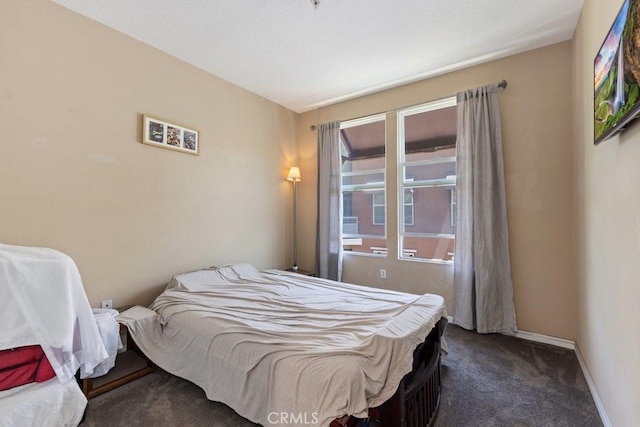 12688 Chapman Ave Unit 3403, Garden Grove, CA 92840 - bedroom featuring dark colored carpet and baseboards