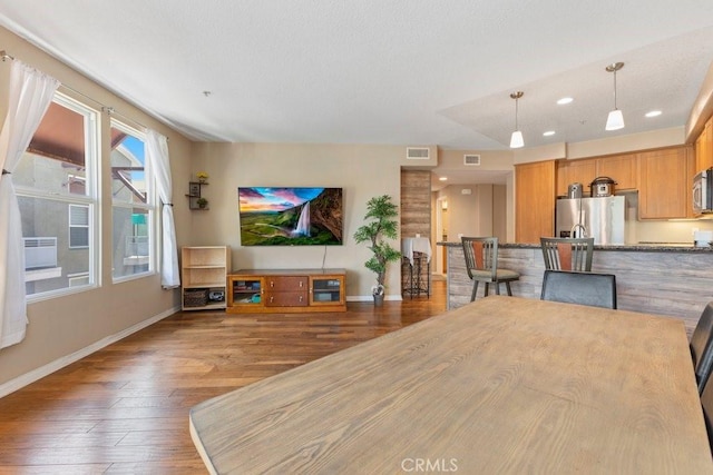 12688 Chapman Ave Unit 3403, Garden Grove, CA 92840 - dining space featuring hardwood / wood-style flooring and recessed lighting