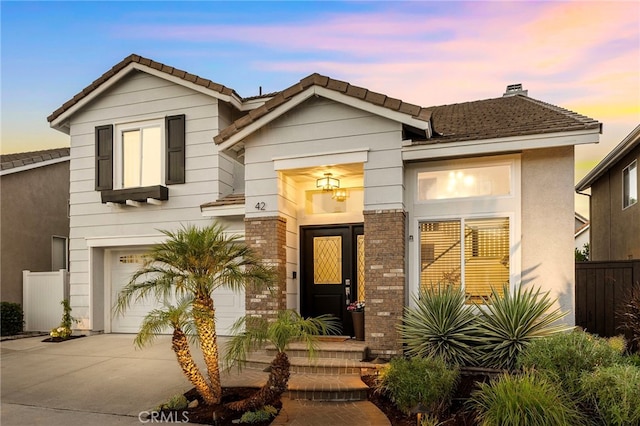 42 Beech Dr, Aliso Viejo, CA 92656 - view of front of house with driveway, a garage, and a tile roof