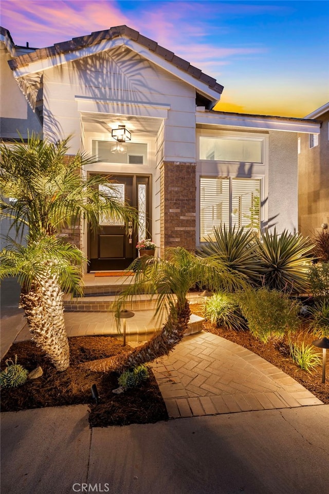42 Beech Dr, Aliso Viejo, CA 92656 - view of exterior entry with stone siding