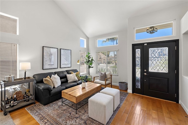 42 Beech Dr, Aliso Viejo, CA 92656 - entrance foyer featuring high vaulted ceiling and light wood-style flooring