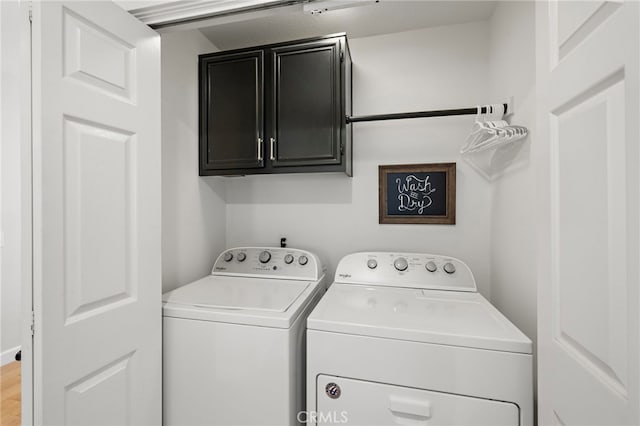 42 Beech Dr, Aliso Viejo, CA 92656 - laundry room featuring cabinet space and separate washer and dryer