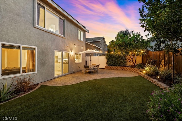 42 Beech Dr, Aliso Viejo, CA 92656 - fenced backyard with a patio area