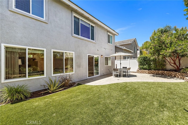 42 Beech Dr, Aliso Viejo, CA 92656 - rear view of house featuring stucco siding and a patio