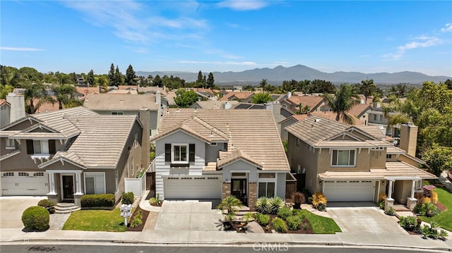 42 Beech Dr, Aliso Viejo, CA 92656 - view of front of house featuring concrete driveway, a garage, and a tile roof