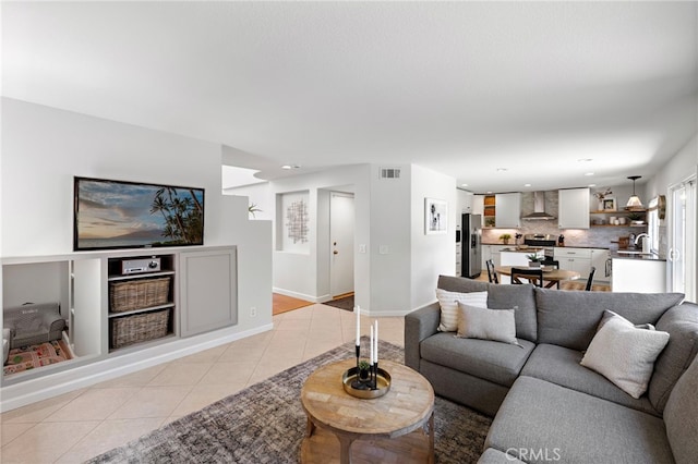 42 Beech Dr, Aliso Viejo, CA 92656 - living room with light tile patterned floors and recessed lighting