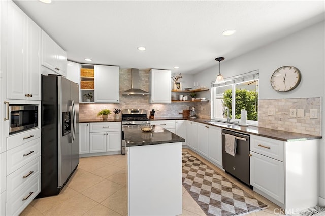 42 Beech Dr, Aliso Viejo, CA 92656 - kitchen featuring stainless steel appliances, wall chimney exhaust hood, open shelves, dark countertops, and recessed lighting