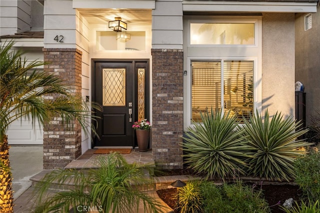 42 Beech Dr, Aliso Viejo, CA 92656 - entrance to property featuring brick siding and stucco siding