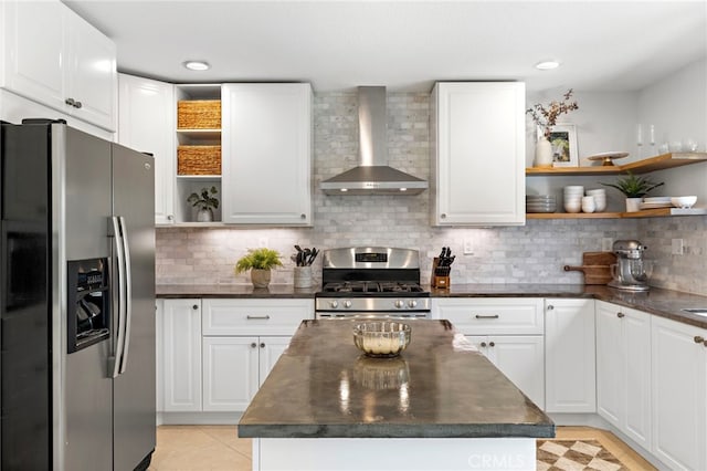 42 Beech Dr, Aliso Viejo, CA 92656 - kitchen featuring stainless steel appliances, open shelves, wall chimney range hood, and white cabinets