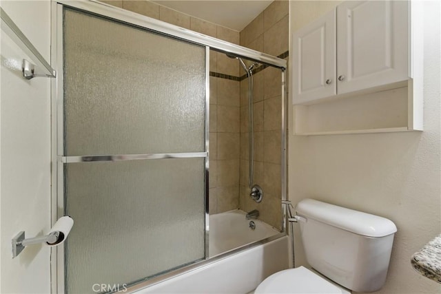 500 Jackson Pl Unit 118, Glendale, CA 91206 - full bathroom featuring toilet and shower / bath combination with glass door