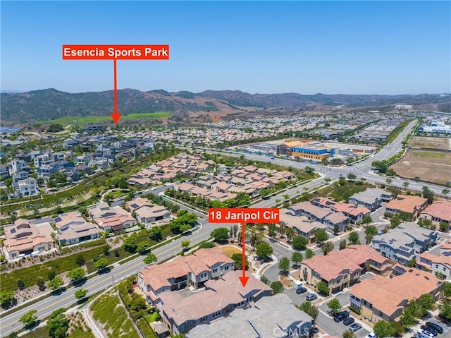 18 Jaripol Cir, Rancho Mission Viejo, CA 92694 - aerial view of property's location featuring nearby suburban area and a mountainous background
