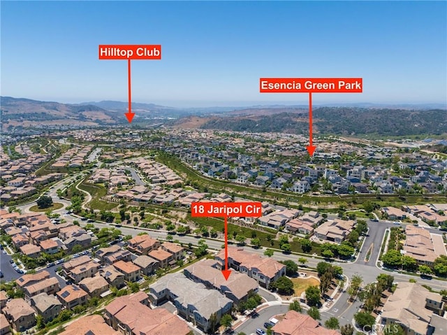 18 Jaripol Cir, Rancho Mission Viejo, CA 92694 - aerial view of property and surrounding area featuring nearby suburban area and a mountain backdrop