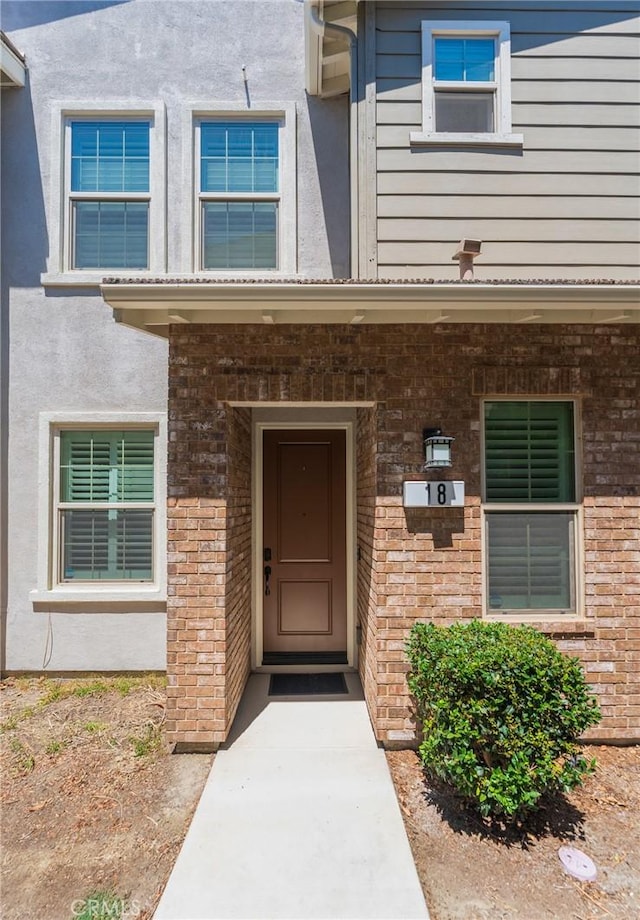 18 Jaripol Cir, Rancho Mission Viejo, CA 92694 - doorway to property with stucco siding