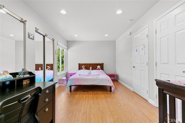 20623 Russ Jay St, Saugus, CA 91350 - bedroom with light wood-style flooring and recessed lighting