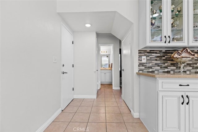 20623 Russ Jay St, Saugus, CA 91350 - corridor featuring light tile patterned floors and baseboards