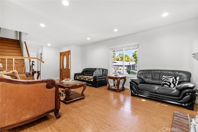 20623 Russ Jay St, Saugus, CA 91350 - living area featuring wood finished floors, stairs, and recessed lighting