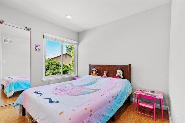20623 Russ Jay St, Saugus, CA 91350 - bedroom with wood finished floors and recessed lighting
