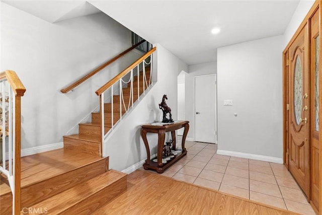 20623 Russ Jay St, Saugus, CA 91350 - entrance foyer with stairway, recessed lighting, and light tile patterned floors