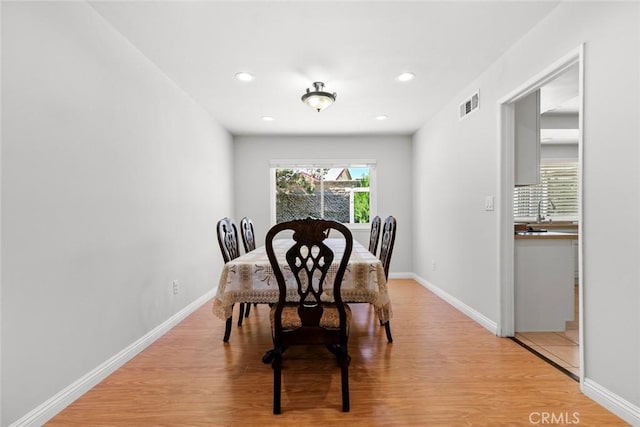 20623 Russ Jay St, Saugus, CA 91350 - dining space with light wood-style floors and recessed lighting