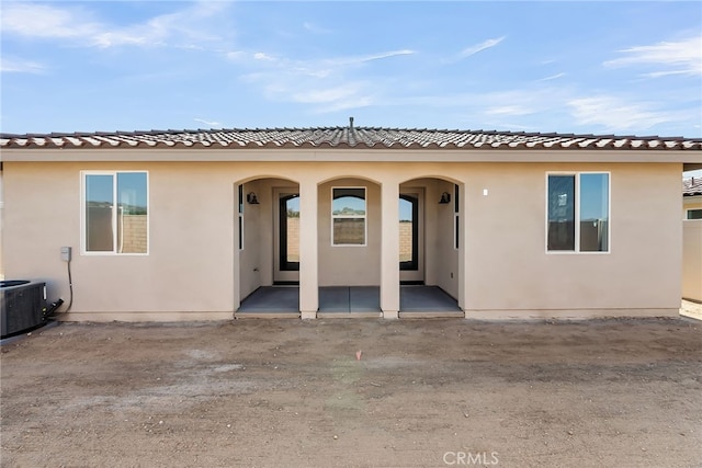 7420 Desert Sky Dr, Yucca Valley, CA 92284 - back of house featuring stucco siding, a porch, and a tile roof