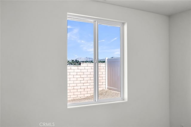 7420 Desert Sky Dr, Yucca Valley, CA 92284 - unfurnished room featuring healthy amount of natural light and a mountain view